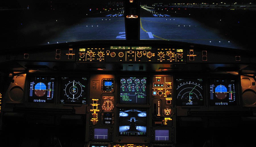 Airliner flight deck at night
